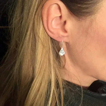 Victoria Elegant Silver Earrings in Dandelion Leaf Design |