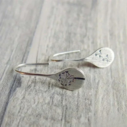 Victoria Elegant Silver Earrings in Dandelion Leaf Design |